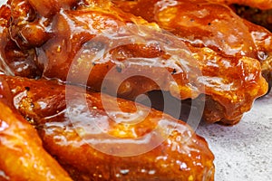 Plate of barbecued chicken wings