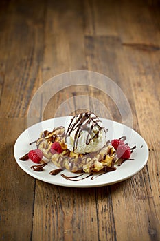 plate of belgian waffle with ice cream