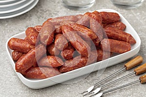 Plate with Cabanossi sausages close up