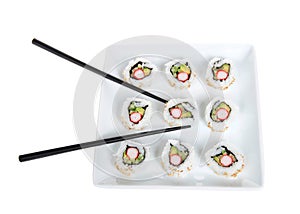 Plate of california roll sushi with chop sticks, isolated