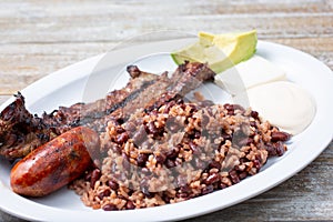 plate of carne asada and casamiento photo