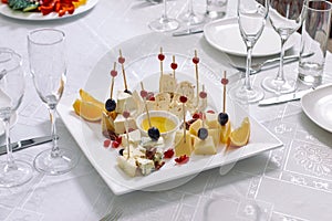 Plate of cheese and fruit