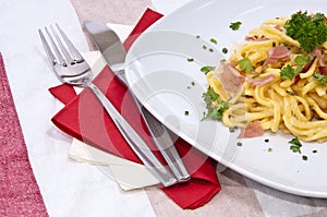 Plate with Cheese Spaetzle on tablecloth