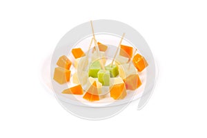 Plate of cheese and tooth sticks.