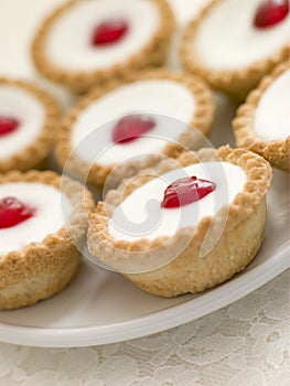 Plate of Cherry Bakewell Tarts