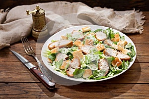 Plate of chicken caesar salad