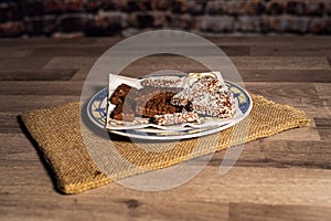 plate of chocolate chip cookies on a burlap tablecloth