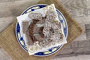 Plate of chocolate chip cookies on a burlap tablecloth