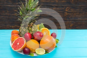 Plate of colorful healthy fresh tropical fruit