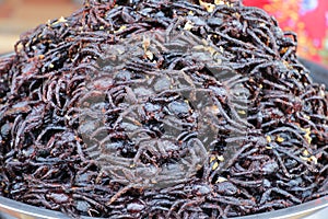 Plate of cooked spider sold in a Cambogian street market