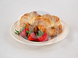 Plate with Croissants and Strawberries.