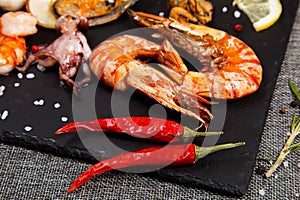 Plate of crustacean seafood with mussels, hrimps, oysters