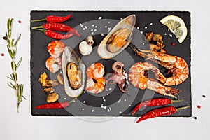 Plate of crustacean seafood with mussels, hrimps, oysters