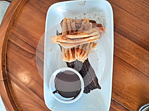 a plate of curros plus chocolate