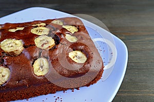 Plate of Delectable Fresh Baked Wholemeal Chocolate Banana Cake photo