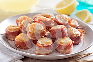 A plate of delicious bacon wrapped scallops