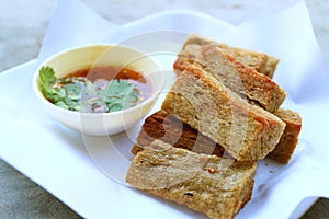 Plate of Deep Fried Fish Crackers or Kropek