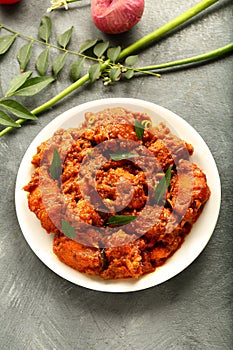 Plate of delicious Indian cooking -mutton curry .