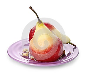 Plate with delicious poached pears in red wine on white background