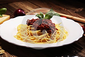 Plate of delicious spaghetti Bolognaise or Bolognese with savory
