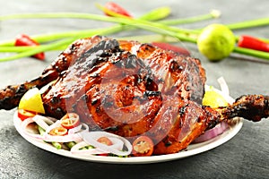 Plate of Delicious tandoori chicken -Indian cuisine,