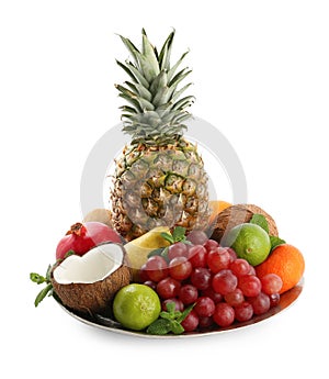 Plate with different ripe fruits on white background