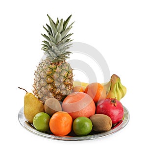 Plate with different ripe fruits on white background