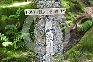 The plate: Don`t feed the trolls in forest in Norway. photo