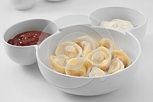 plate with dumplings on white background.