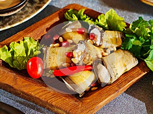 a plate of eggplant rolls. delicious snack of vegetables.