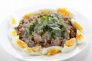 Plate of Egyptian foul with eggs