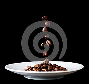 Plate with falling coffee grain