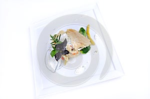 Plate of fine dining meal - lemon sole vegetables