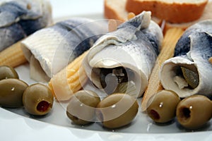 Plate of fish with olives