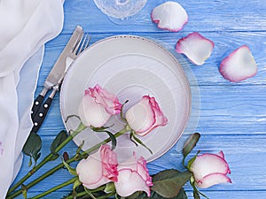 Plate flower rose wooden backgroundn elegance rustic photo