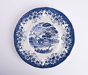 plate or flowers on plate painted by hand on background.