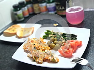 Plate of food, vitamind and good diet, omlet, olives, suplements