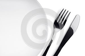 Plate, fork and knife photo