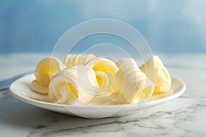 Plate with fresh butter curls