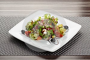 Plate with fresh greek salad