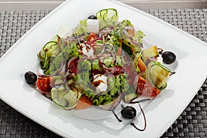 Plate with fresh greek salad