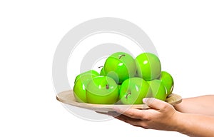 A plate of fresh green apples