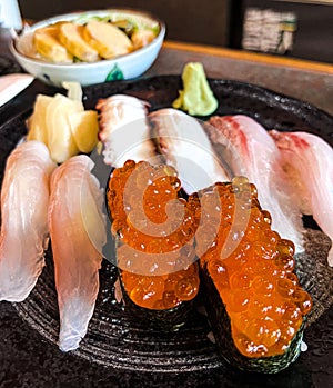 A plate of fresh nigiri sushi