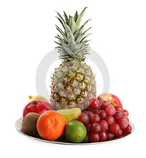 Plate with fresh ripe fruits on white background