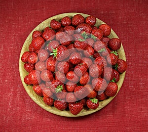 Plate of fresh strawberies. Vitamins, diet, health