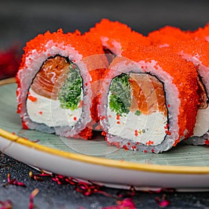 Plate of Fresh Sushi Rolls on White Dish