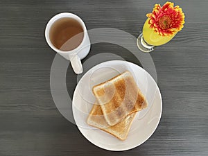 Freshly toasted bread with a cup of tea