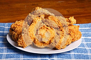 Plate of Fried Chicken on Blue Plaid Towel