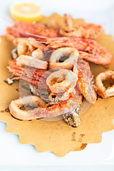 Plate with fried local fishes and seafood