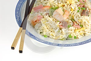 Plate of fried rice and chopsticks